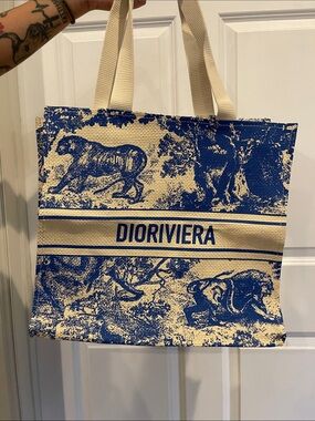 Dior Blue and Cream CD Tote. Made of Straw Material- perfect for swimming.